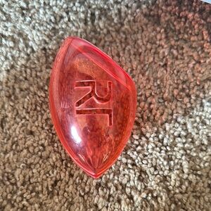 Translucent orange makeup sponge case